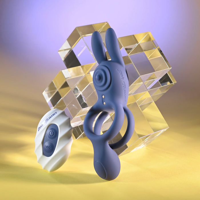 purple bunny with ball holder, beside remote