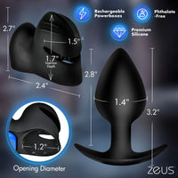 Black silicone butt plug with dimension annotations showing length, width, and opening diameter, plus feature icons for rechargeable powerboxes, phthalate-free, premium silicone, and ZEUS branding.