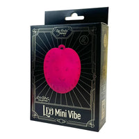 pink round massager with lions face, zodiac sign leo on box packaging