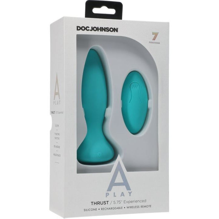The image shows the product packaging for the Doc Johnson A-Play Thrust Vibrating Anal Remote Control. The box is predominantly white with a clear window displaying the blue silicone anal plug and the remote control.
