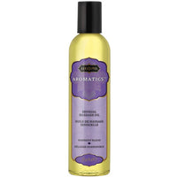 A bottle of Kama Sutra Aromatic Massage Oil in Harmony Blend with a purple label.