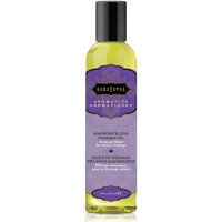 A bottle of Kama Sutra Aromatic Massage Oil in Harmony Blend with a purple label.