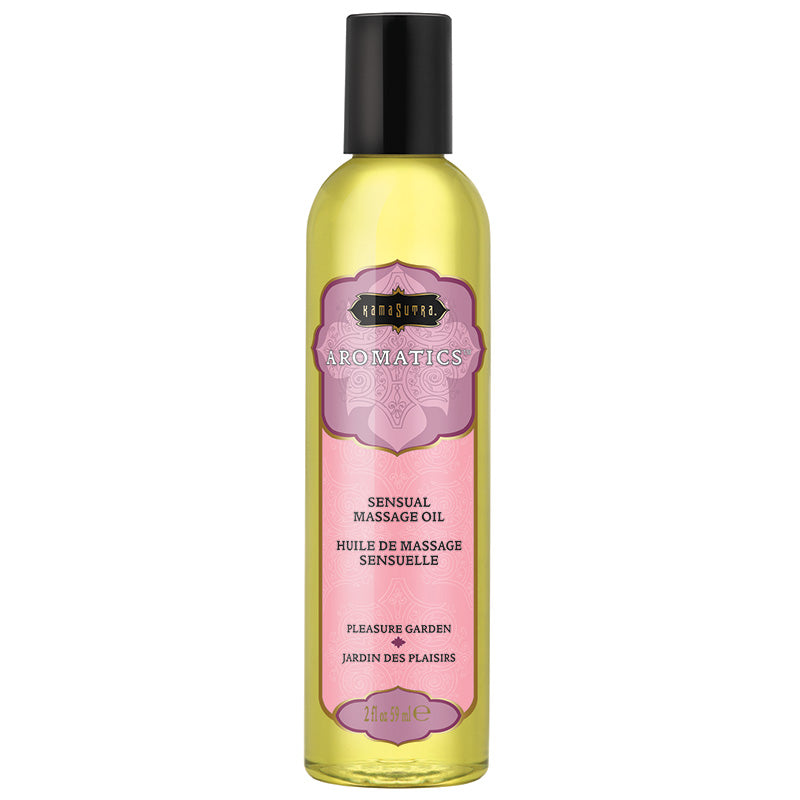 A bottle of Kama Sutra Aromatic Massage Oil with a label that has a pink and green color scheme and text indicating it is for 'Pleasure Garden'.