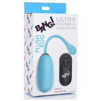 The image shows a plush egg vibrator in a light blue color, packaged in a box with the brand name 'XR'. The box also displays a wireless remote control with buttons for easy operation.