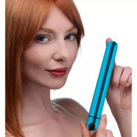 ultra slim blue bullet held by woman