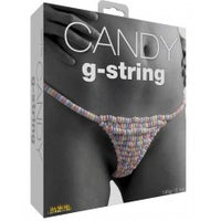 The image displays the packaging of the "Candy G-String by Hott Products," showcasing the product in a clear and straightforward manner. The box features a close-up view of the G-string panties, which are designed to be multi-flavored, adding an element of playful indulgence.
