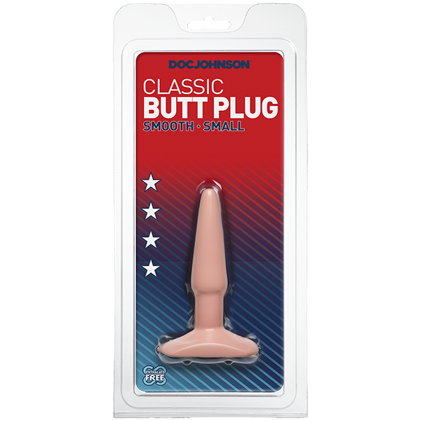The product is a small, smooth, tear-drop shaped butt plug with a wide base, packaged in a clear plastic case. The background is red with white stars.