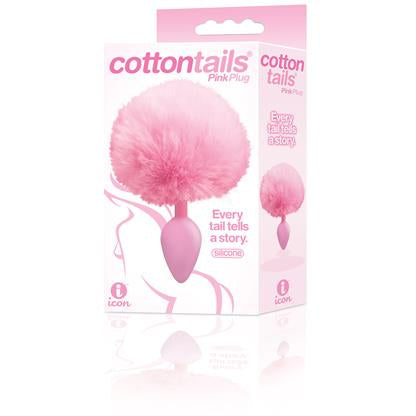 The product image shows the packaging of the Cotton Tails Anal Plug, with the plug itself visible. The plug is pink, with a fluffy white fur attachment, and is shown in a clear plastic package with branding and product information.