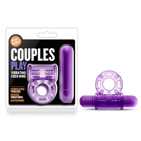 The image shows a purple vibrating cock ring along with its packaging. The packaging has the text 'Couples Play Vibrating Cock Ring' prominently displayed.