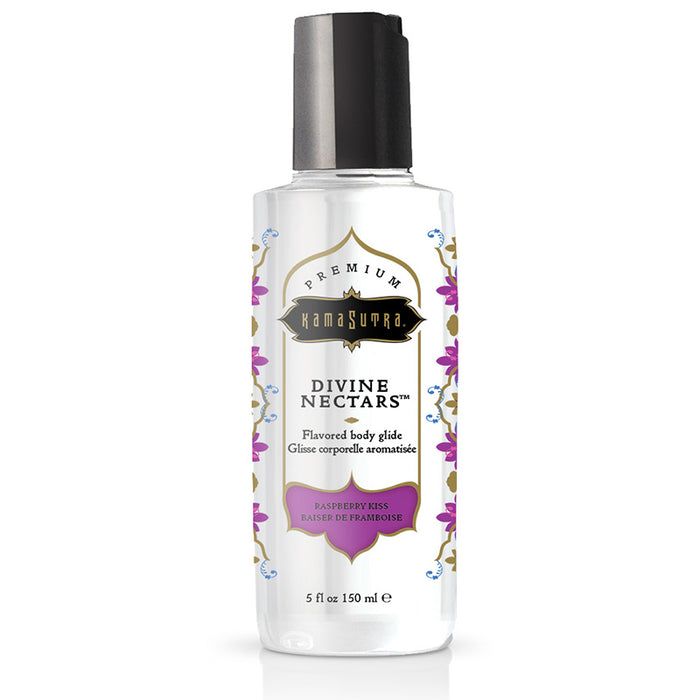 A bottle of Divine Nectars Body Glide by Kama Sutra with a raspberry kiss flavor, indicating a pink color inside the transparent bottle. The label has purple and pink floral designs.