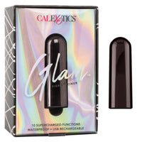 The image shows the packaging of the Cal Exotics' Glam Vibrating Bullet. The box is metallic with a reflective surface, displaying the product name and features like '10 supercharged functions', 'Waterproof', and 'USB rechargeable'.
