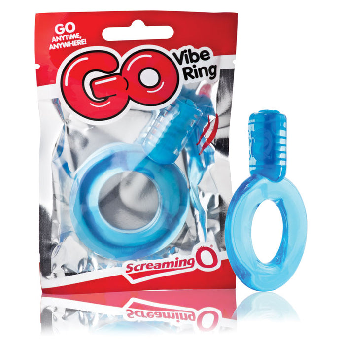 The image shows the Screaming O GO Vibrating Cock Ring in blue color, packaged in a transparent plastic bag with red and white branding. The ring has a clear blue cylinder attached to a solid blue ring.