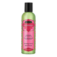 A bottle of Naturals Strawberry Divine Massage Oil by Kama Sutra with a pink label and green liquid.