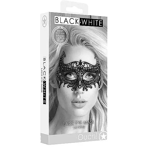 A black lace eye mask with intricate designs, displayed on a white background. The product packaging shows a model wearing the mask, emphasizing its elegance and fit.