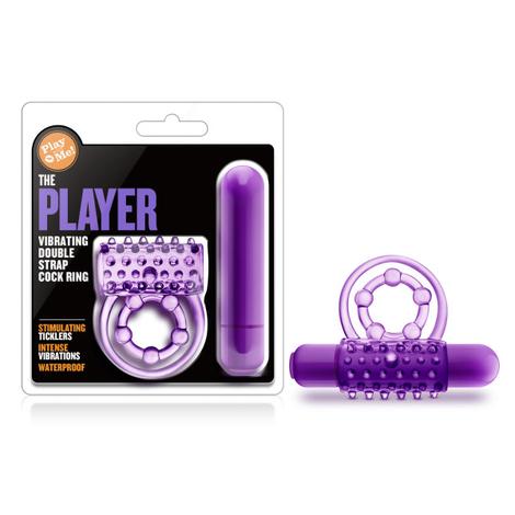 The product image shows a purple vibrating double strap cock ring along with its packaging. The box highlights the features like vibrations, waterproof design, and stretchy material.