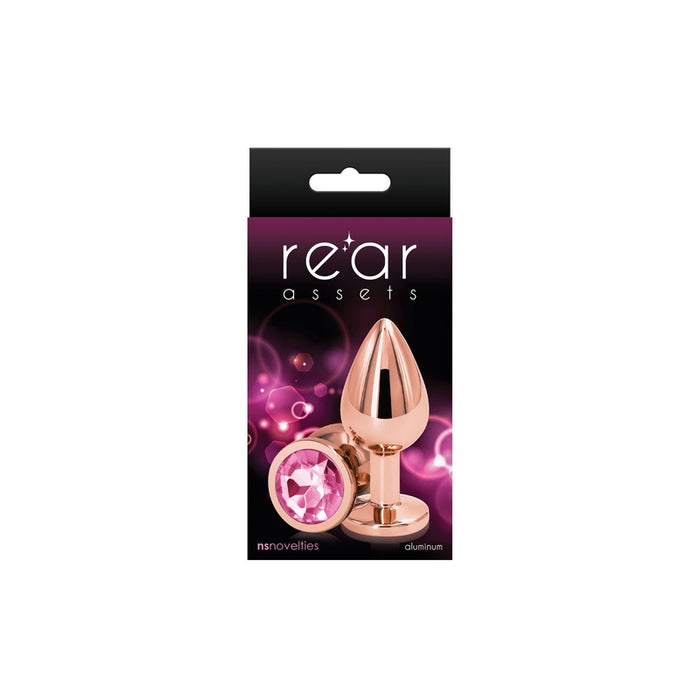 The product image shows a rose gold-colored aluminum anal plug with a pointed tip and a circular base, packaged in a box with a purple background and pink accents.