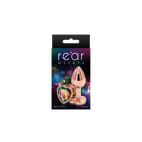 The product image shows a packaged anal plug with a heart-shaped pink tip. The plug has a metallic, chrome-plated finish and is displayed in its retail packaging, which is black with a purple and pink backdrop.