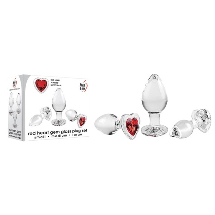 The image shows a 3-piece glass plug set with heart-shaped red gem bases. The plugs are teardrop-shaped and have a tapered tip.