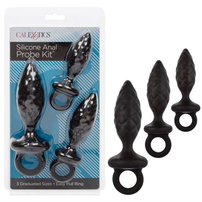 The image shows a black silicone anal probe kit with three graduated sizes, each featuring a tapered design and an easy pull ring. The probes are displayed both in their packaging and separately.