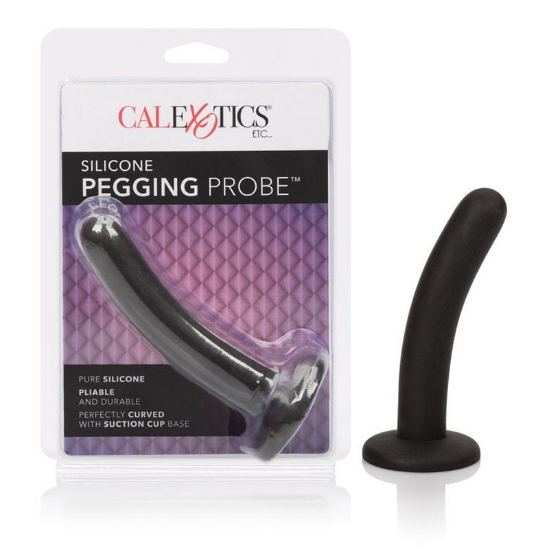 The image shows a black silicone pegging anal probe with a curved design and a round tip. The product is displayed both in and out of its packaging, which features the Cal Exotics branding.