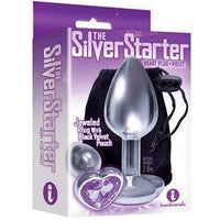 The product image shows the packaging of "The Silver Starter Heart Plus" anal plug, which is purple and has a jeweled design. The package is predominantly pink and showcases the plug alongside its features.