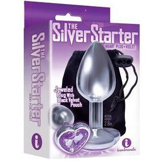 The product image shows the packaging of "The Silver Starter Heart Plus" anal plug, which is purple and has a jeweled design. The package is predominantly pink and showcases the plug alongside its features.