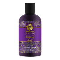 A bottle of Sliquid Soak bubble bath in green tea scent, with purple packaging and floral designs.