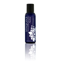 A bottle of Naturals Satin Water-Based Lubricant by Sliquid with a blue label featuring a white flower design.