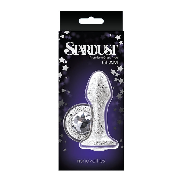 The product image shows the Stardust anal plug in its packaging. The plug is silver with glitter and colored crystal accents, and the packaging is black with star decorations.