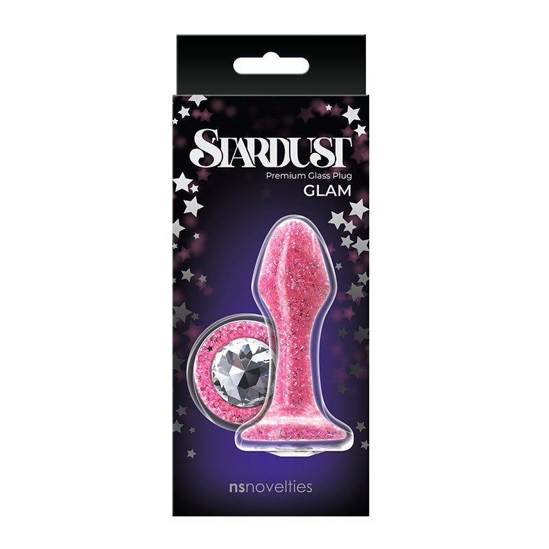 The product image shows the Stardust anal plug in its packaging. The plug is pink with glitter and colored crystal accents, and the packaging is black with star decorations.