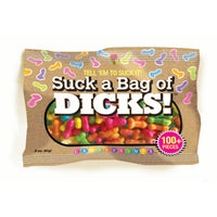 This image displays a playful and humorous candy pack labeled "Suck a Bag of Dicks" by Little Geenie. The candy pack, which contains over 100 pieces, features a colorful assortment of small, multi-colored candies designed in the whimsical shape of penises.