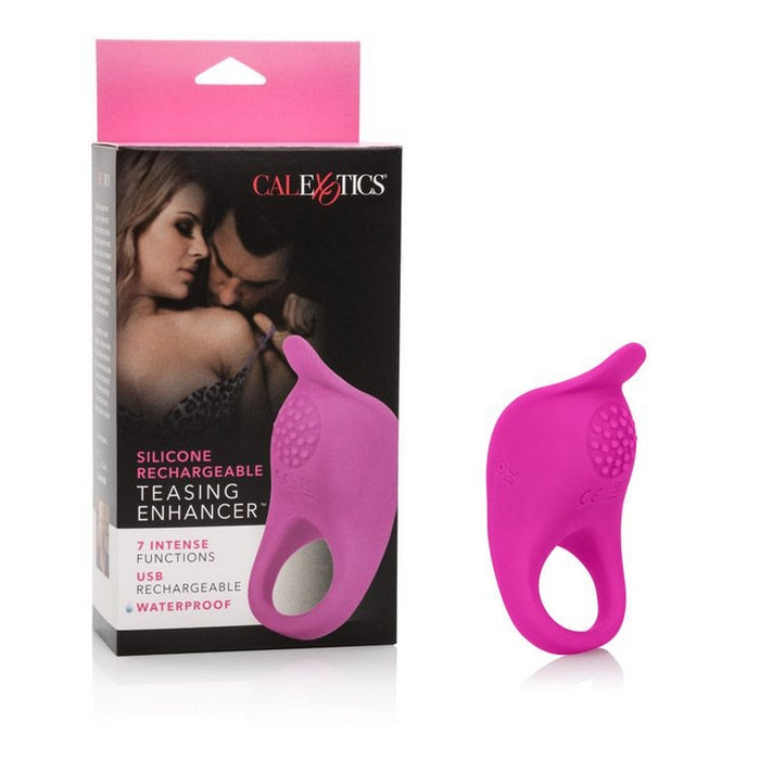 The image shows a pink cock ring along with its packaging. The packaging has a picture of a couple embracing and the product's features mentioned.