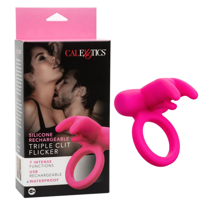 A bright pink silicone cock ring with clitoral stimulators, shown alongside its packaging. The box features an intimate image of a couple and highlights the product's features, including its rechargeable and waterproof qualities.