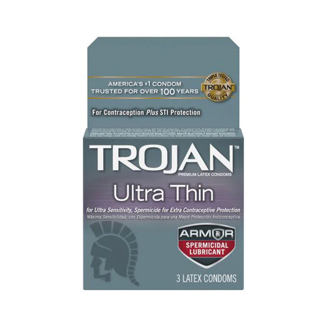 Packaging for Trojan Ultra Thin Armor Condoms with the claim of 'Ultimate Sensitivity' and 'Same Strength as Ultra Thin Trojan Latex Condoms'. It mentions the inclusion of a spermicidal lubricant and the product is designed for contraception plus STI protection.