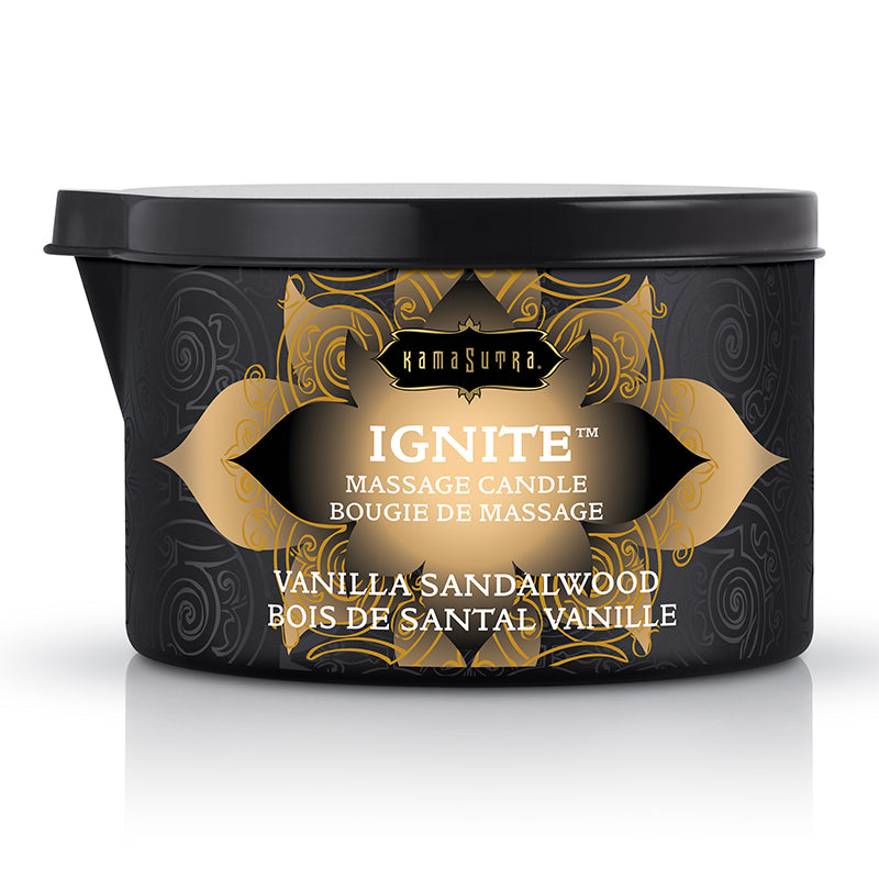 A black container of Ignite Massage Candle Vanilla Sandalwood with golden and white label and design elements, with a pour spout on the lid.